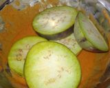A picture of step 1 of Brinjal fritters.