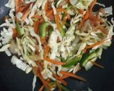 A picture of step 4 of Peri peri noodles with pan fried chicken.