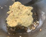 A picture of step 1 of Tamarind side dish parupu urandai puli kozumbu.