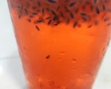 A picture of step 3 of Rooh Afza with basil.