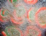 A picture of step 5 of Swirl colourful masala mathri.