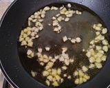 Foto del paso 3 de la receta: Filetes de merluza y patatas al vapor con picada