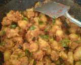 A picture of step 4 of Masala aloo / spicy potato.
