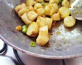 A picture of step 6 of Crispy Arbi masala.