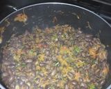 A picture of step 6 of Fried njahi (black beans).