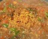 Foto del paso 4 de la receta: Pollo guisado con tomate y naranja