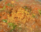 Foto del paso 4 de la receta: Pollo guisado con tomate y naranja