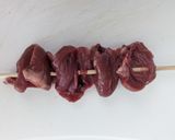 A picture of step 2 of Chicken heart kebabs with peanut satay dip.