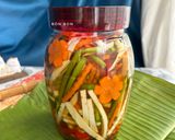 A picture of step 5 of Sweet and Sour Pickled Water Spinach and Palm Heart.