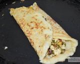 A picture of step 13 of Moong dal (lentil) and chickpea roll (chila).
