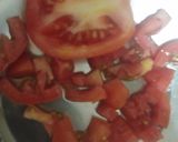 A picture of step 1 of Onian tomato carrot salad.