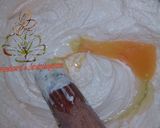 A picture of step 4 of #bakecake multicolored marble birthday cake.