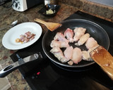 Foto del paso 2 de la receta: Alitas y muslitos al ajillo