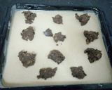 A picture of step 2 of Cinnabon Cinnamon Roll Cake.