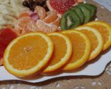 Une image de l'étape 4 de Assiette composée de fruits frais coupés et fruits a coque 🍴.