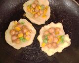 A picture of step 6 of Corn with smashed potatoes.