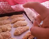 Foto del paso 3 de la receta: Tiras de pollo al horno con parmesano