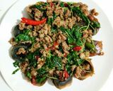 A picture of step 5 of Stir-Fried Minced Pork with Holy Basil and Century Eggs.