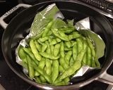 A picture of step 3 of Edamame in a Cast Iron Pot..
