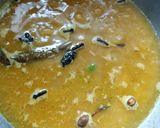 A picture of step 4 of Basanti Pulao / Bengali sweet yellow rice.