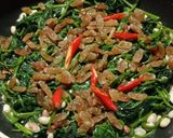 A picture of step 4 of Espinacas a la Catalana.