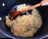 A picture of step 2 of Chicken Arroz Caldo.