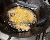 A picture of step 2 of Honey glazed baby corn.
