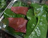 A picture of step 1 of HCG Diet meal 11: spinach and beef fillets.