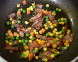 A picture of step 4 of Butter-Sautéed Spinach with Caramelized Soy Sauce.
