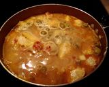 A picture of step 5 of Spanish rice with chicken.