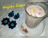 A picture of step 3 of Fruity Pebbles Milk Shake.