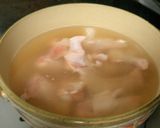 A picture of step 1 of Asari Clam and Chicken Drumette Salt and Butter Hot Pot.