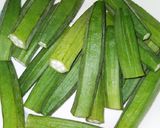 A picture of step 1 of Stuffed Curried Okra.