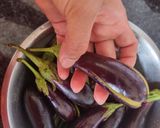 A picture of step 1 of Stuffed Brinjal potatoes in gravy.