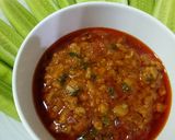 A picture of step 3 of Nam Prik Ong (Red Curry Paste Version).
