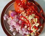 Foto langkah ke 5 dari resep Oseng daun dan bunga pepaya gantung.