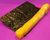 A picture of step 4 of Decorated Sushi Rolls: Snowmen Nori Rolls.