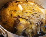 A picture of step 4 of Mushrooms and Tofu Simmered With Egg.