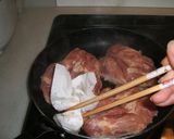 A picture of step 2 of Chicken Cooked with Coke.
