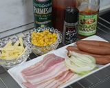 A picture of step 1 of Pizza-Bacon Pain d'Epi & Sausage Pain d'Epi.