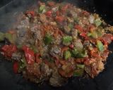 A picture of step 14 of Beef with Peanuts, Peppers, and Ginger.