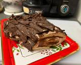 Foto del paso 10 de la receta Tronco de Navidad 🎄🎁 relleno de nata y praliné de avellanas y chocolate sin lactosa