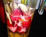 A picture of step 2 of Strawberry Apple water.