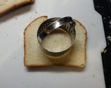 A picture of step 1 of Egg in Toast! (AKA: Toad in a Hole😂😂).