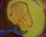 A picture of step 6 of Orange Marble Swiss Roll.
