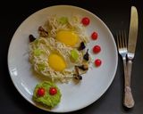 A picture of step 5 of Poached Egg in noodle basket.