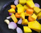 A picture of step 2 of Pumpkin and carrot soup.