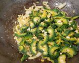 A picture of step 4 of Achaari Karela.