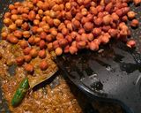 A picture of step 3 of Mochar ghonto (banana flower curry).