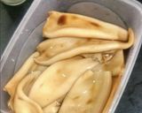 A picture of step 1 of Stuffed squid.